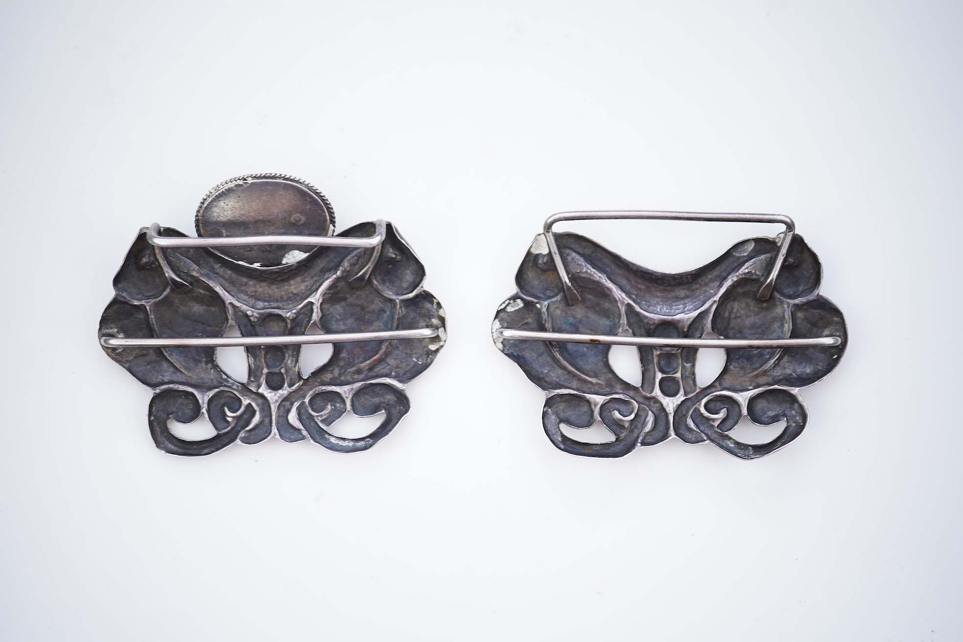 An Arts & Crafts silver and amber buckle, Denmark, early-mid 20th century